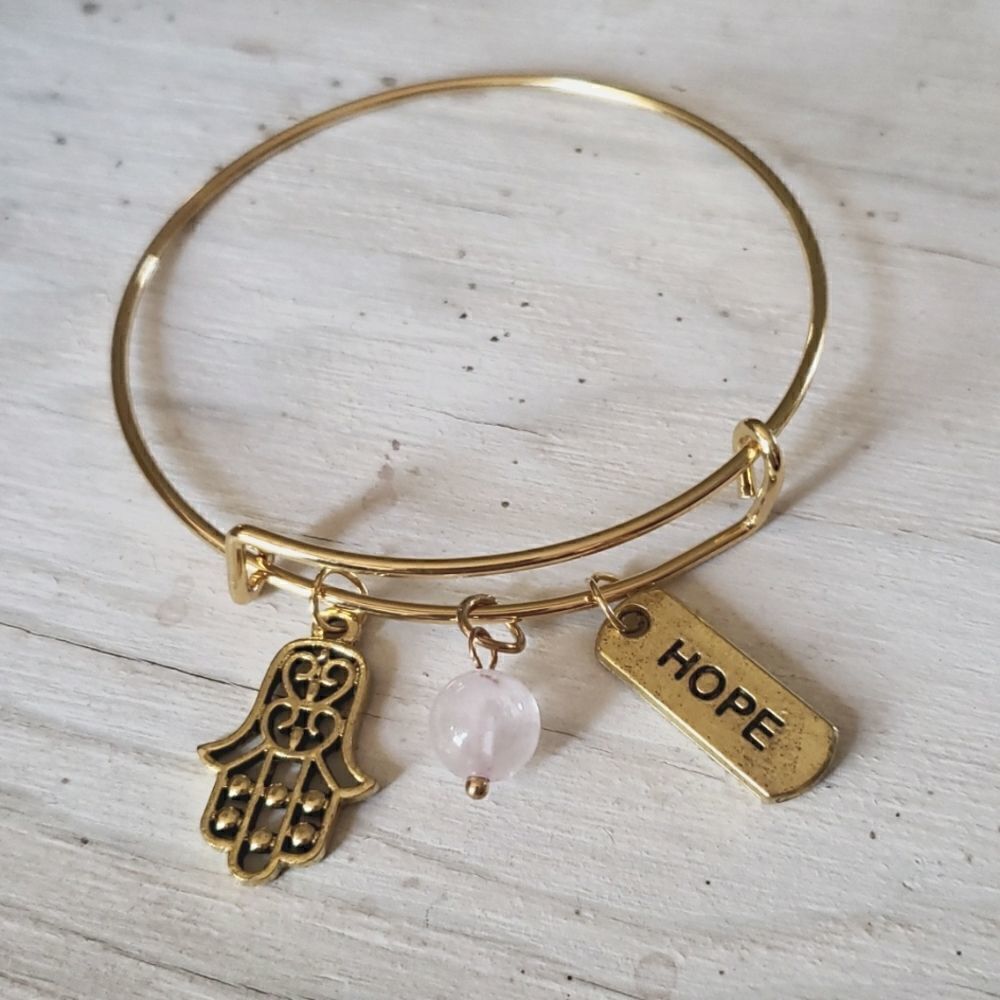 Bracelets by Sandra gold tone adjustable, Hope